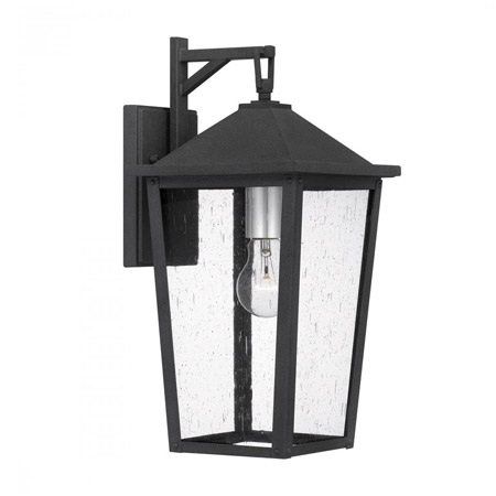 Stoneleigh Collection 1-Light Outdoor Wall Mount Lantern in Mottled Black with Clear Seedy Glass Panels Quoizel STNL8408MB